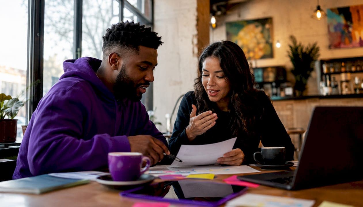 Two creators collaborating on skit video script